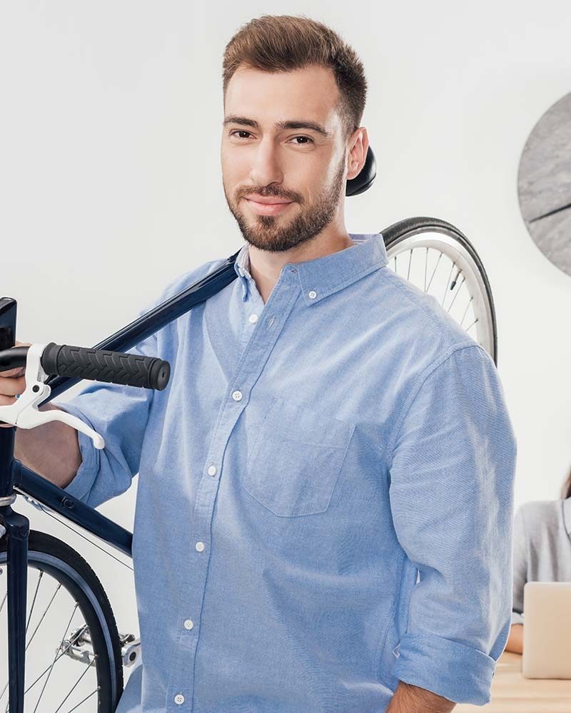 portrait-of-businessman-holding-bicycle-while-coll-CUM9ZRY-r10lfy91if1fas0d9g8bqss4va7z517oe36lg1kcuo